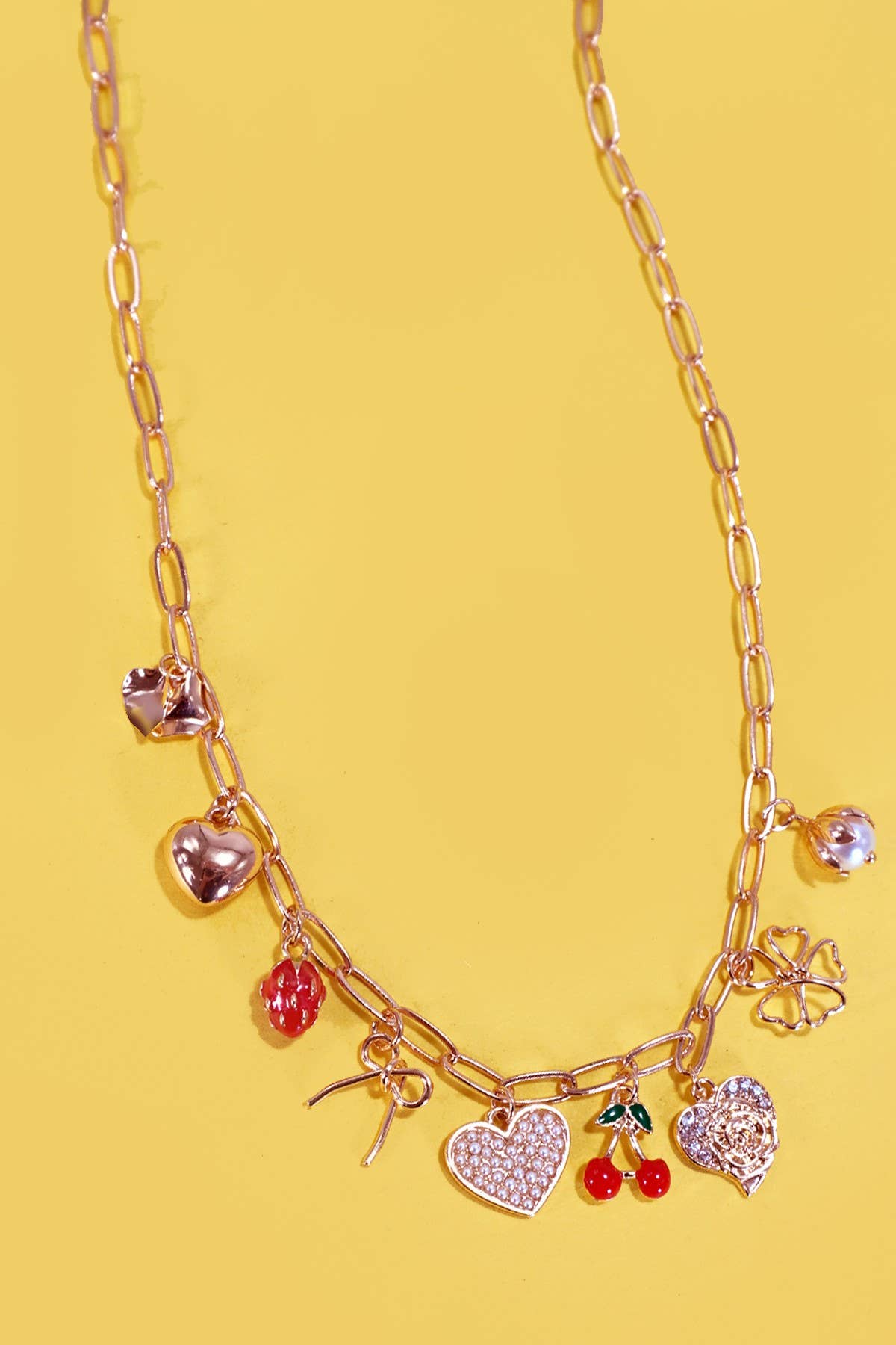 JOSSLYN by wall to wall - MULTI CHARM BOW CHERRY HEART NECKLACE | 80N1190