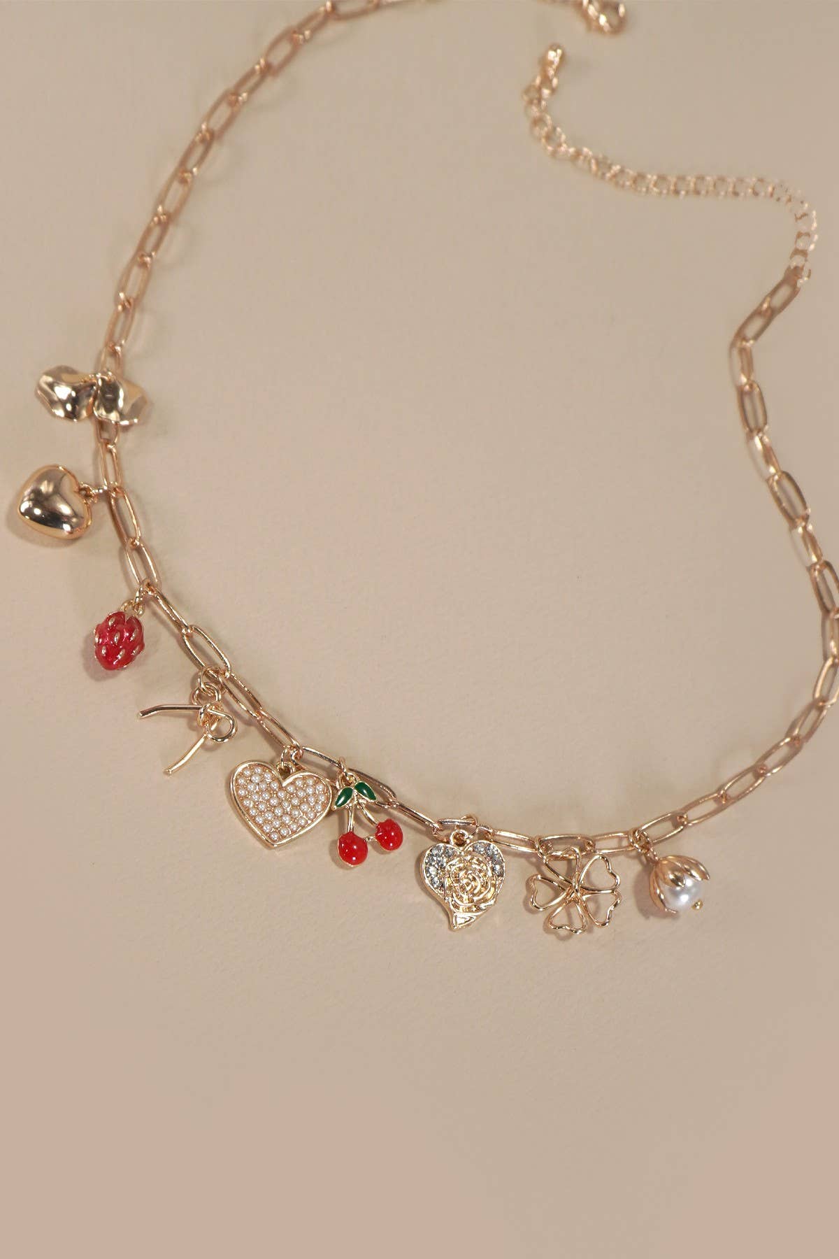 JOSSLYN by wall to wall - MULTI CHARM BOW CHERRY HEART NECKLACE | 80N1190