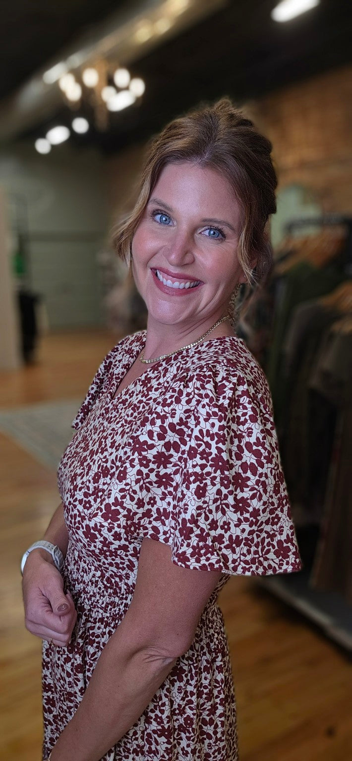 Lacy wearing the Mikarose Eden Maxi Dress in Yuletide Bloom, size small; sleeve detail view.