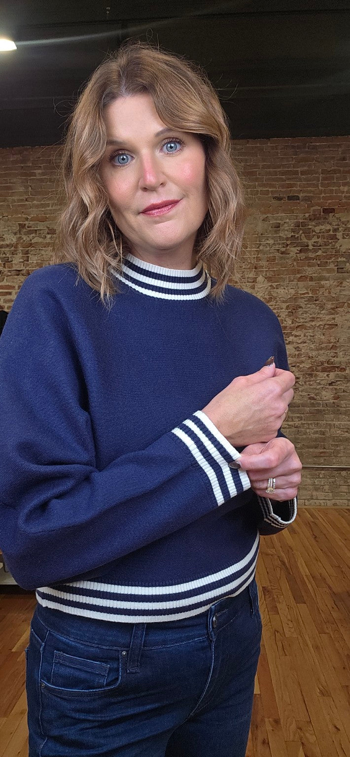 Lacy wearing the navy Gameday Dolman Sweater
